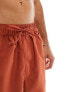 ASOS DESIGN swim shorts in mid length in rust