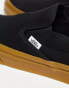 Vans classic slip on gum sole trainers in black