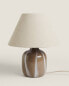 Table lamp with glass base