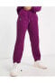 Фото #1 товара Брюки спортивные женские Nike Therma-FIT Cozy Core фиолетовые