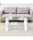 Double layered glass coffee table with white decorative columns and CT-X02 functionality