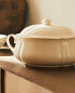 Earthenware tureen with raised-design edge