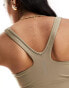 Puma Running Evolve medium support sports bra in brown