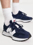 New Balance 327 trainers in blue and white