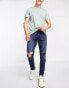 Jack & Jones Intelligence Pete skinny carrot jean with knee rips in blue black wash