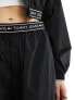 Tommy Jeans baggy taping trackpants in black XXXL - фото #3