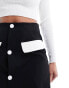 Фото #4 товара In The Style exclusive tailored contrast pocket button through mini skirt co-ord in black