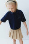 Contrast pleated skirt