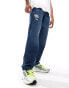 ASOS DESIGN baggy jeans with rips in mid wash blue