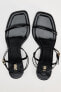 Leather high-heel sandals with tubular strap