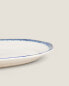 Earthenware serving dish with line design