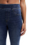 Spanx shape and lift distressed skinny jeans in medium wash blue