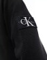 Фото #2 товара Calvin Klein Jeans waffle long sleeve badge logo polo shirt in black