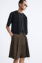 Wide-leg pleated bermuda shorts