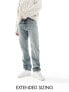 ASOS DESIGN straight leg jeans with abrasions in vintage tinted blue