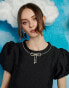 Sister Jane bow embellished puff sleeve top in black