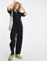 Фото #1 товара Topshop – Strukturierter, durchgeknöpfter Jumpsuit in Schwarz mit Kordelzug