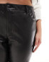 Vero Moda Curve leather look flared trousers in black