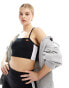 Фото #1 товара ellesse Playsol one shoulder crop top in black