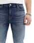 ASOS DESIGN spray on jeans with power stretch in dark wash blue