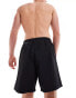 Фото #3 товара Weekday Ed skater style swim shorts in black