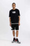 Фото #5 товара Футболка DeFactoFit NBA Wordmark Oversize Fit Басиклет с оверсайз-фасоном, с принтом на горловине, короткий рукав - Спортивный мужской товар