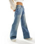 Фото #4 товара Bershka high waisted wide leg jeans in dirty mid blue wash