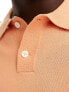 Levi's knitted polo shirt with small logo in orange