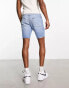 ASOS DESIGN classic rigid regular length denim shorts in light wash blue with rip