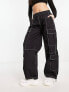 Фото #1 товара Bershka multipocket contrast stitching cargo trousers in black