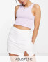 Фото #1 товара ASOS DESIGN Petite split front tennis skort in white