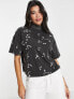 ASOS DESIGN boxy high neck tee in daisy embroidery in washed charcoal