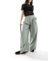 ASOS DESIGN wide leg trouser with pleat detail in sage stripe