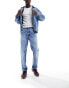 Фото #19 товара ASOS DESIGN tapered fit jeans in light wash blue - LBLUE