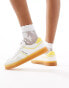 Tommy Jeans court trainers in white and yellow