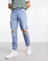 Фото #4 товара ASOS DESIGN tapered fit jeans with busted knees in mid wash blue - MBLUE