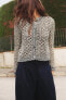 Open-knit metallic thread cardigan