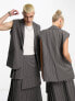 Фото #1 товара COLLUSION Unisex longline waistcoat in dark grey pinstripe co-ord