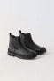 Rubberised ankle boots