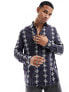 ASOS DESIGN relaxed shirt with contrast broderie stripe