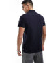 Tommy Hilfiger global stripe monotype regular polo shirt in Navy