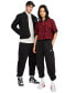 Фото #1 товара Брюки спортивные Nike женские Sportswear Club Fleece Mid-Rise Oversized Cargo Sweatpants