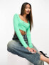 Nike Dance mini swoosh long sleeve crop top in spring green