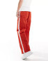 ASOS DESIGN wide nylon trousers in red with white side panel