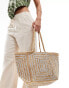 Accessorize straw tote with silver detail in beige