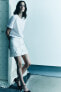 Фото #3 товара Короткая юбка в клетку с цветочным принтом — zw collection ZARA