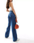 Calvin Klein Jeans high rise relaxed jean in mid wash Mittelblauer Denim, W30 L30 - фото #3