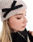 ASOS DESIGN beanie in oatmeal with black bow detail