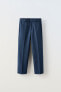 Textured straight fit trousers