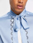 ASOS DESIGN regular satin shirt with tie neck in blue border print